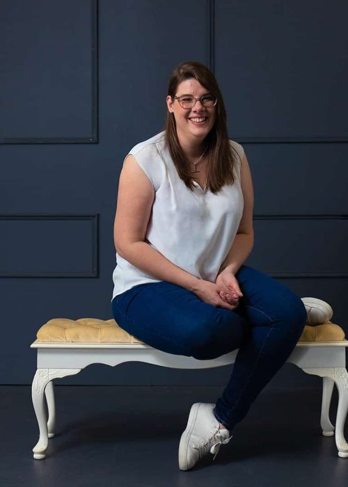 Professional portrait of Bianca Whitehead, website designer, developer, and owner of Wild Wattle Digital, captured in a confident pose, highlighting her expertise and personal brand.